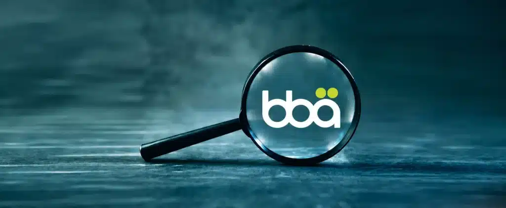Magnifying Glass Reveals BBA Logo